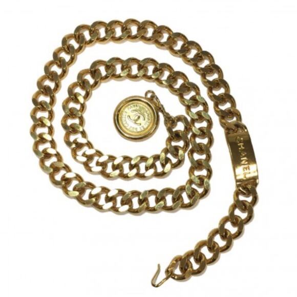 90’s. Vintage CHANEL thick chain belt with golden mademoiselle and CC charm. main image 8